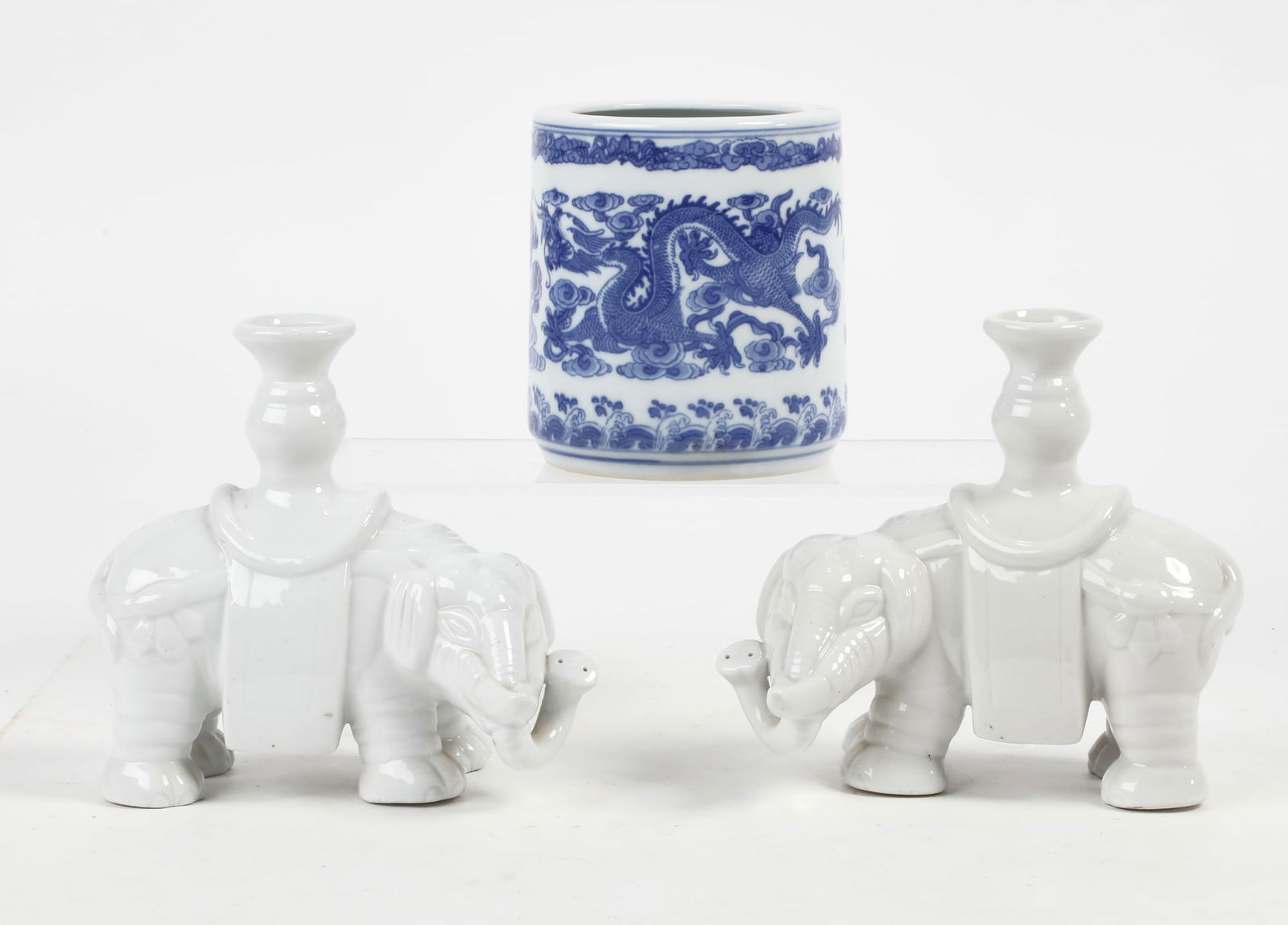 A pair of Asian blanc de chine candlesticks (1 of 3)