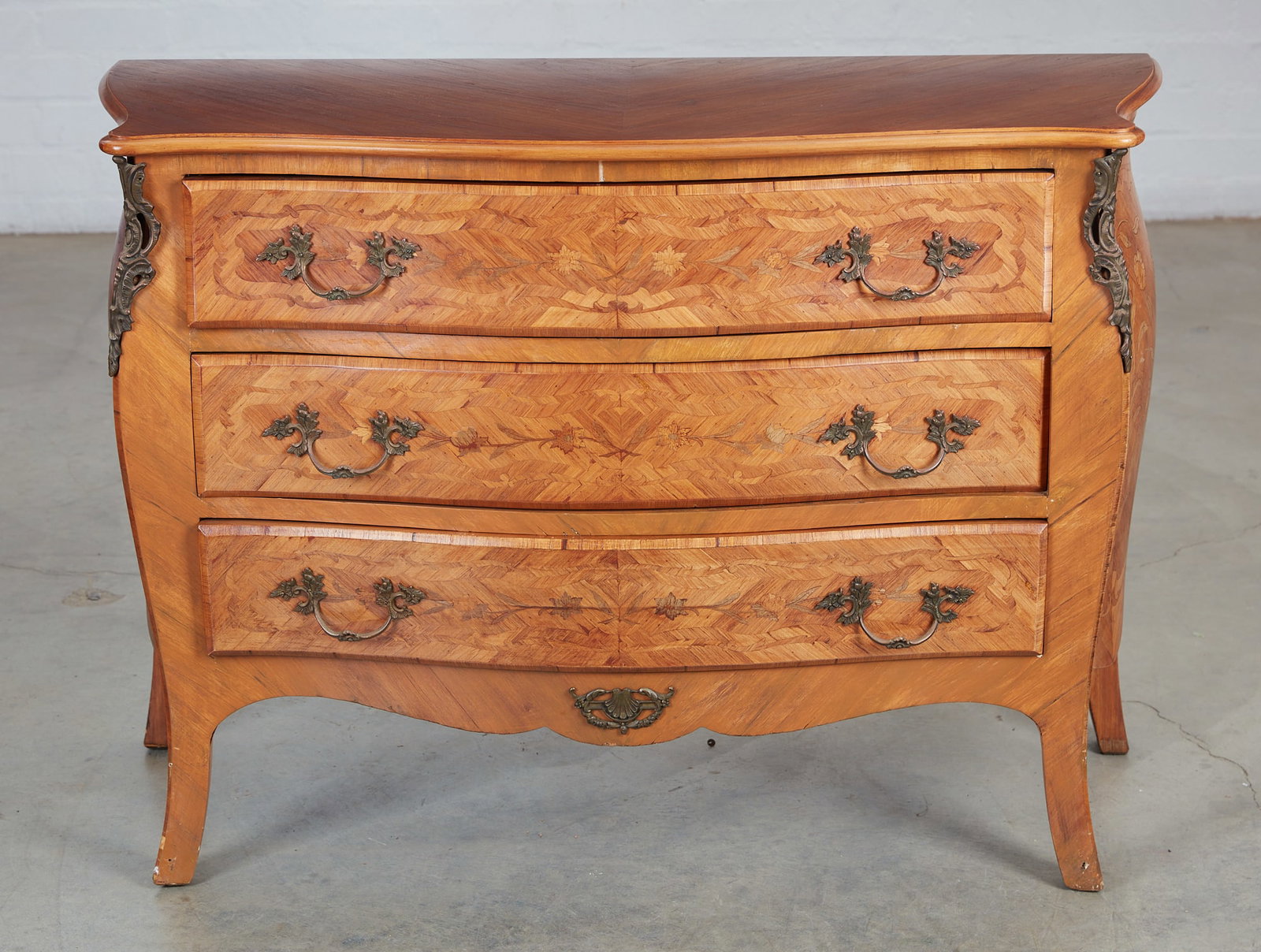A Louis XV style marquetry inlaid commode (1 of 10)