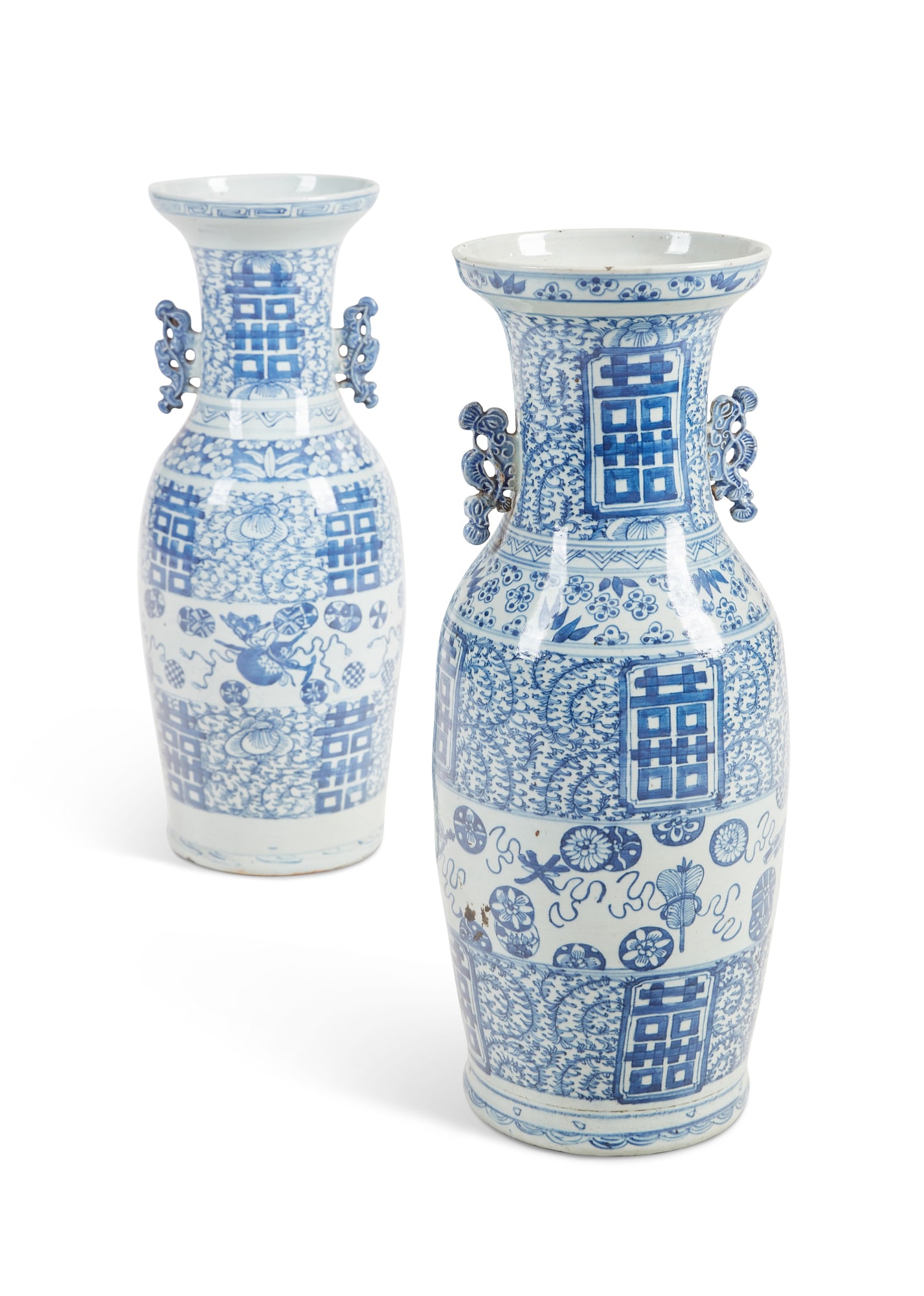 A pair of Chinese blue and white porcelain vases: A pair of Chinese blue and white porcelain vases height 23in (58.5cm); diameter 8 1/2in (22cm) Provenance: The Collection of Fritz & Lucy Jewett, San Francisco, California.