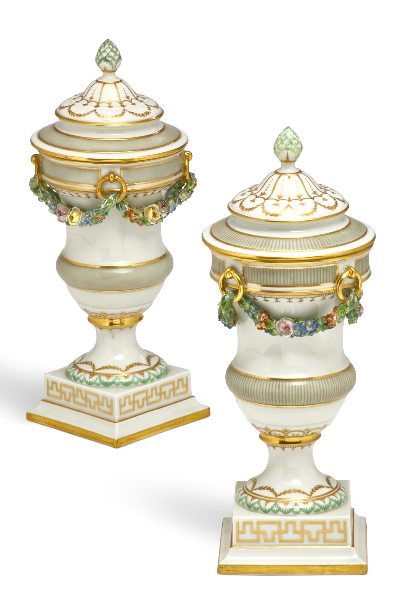 A pair of Royal Copenhagen porcelain vases: A pair of Royal Copenhagen porcelain covered vases early 20th century Underglaze crowned blue wave mark, incised 40/E. height 10in (25cm); diameter 4in (10cm) Provenance: The Collection of Fritz &