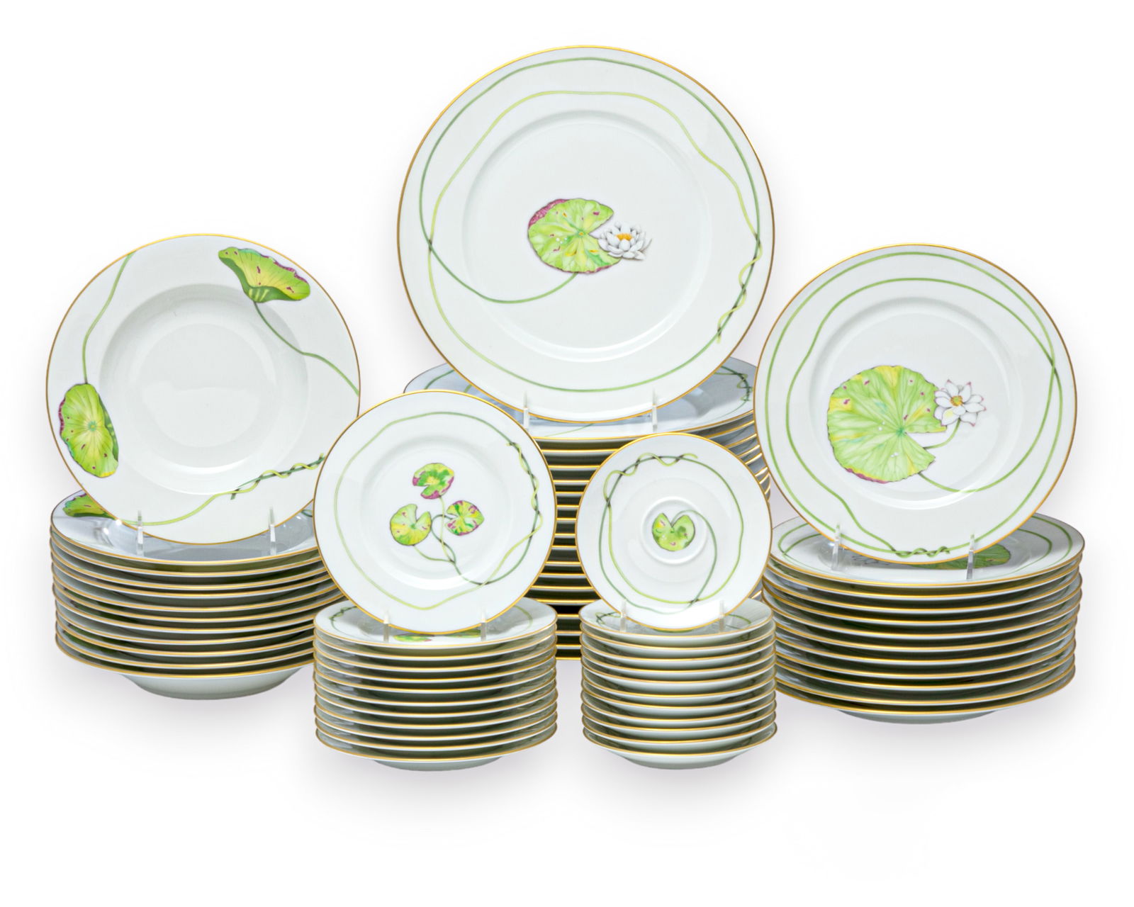 A Hermes porcelain part dinner service: A Hermes porcelain part dinner service in the Nil patterncirca 2005Comprising eighteen 10 3/4in dinner plates; sixteen 8 7/8in salad plates; eight 8 3/4in soup bowls; twelve 6 1/2in bread and butter p