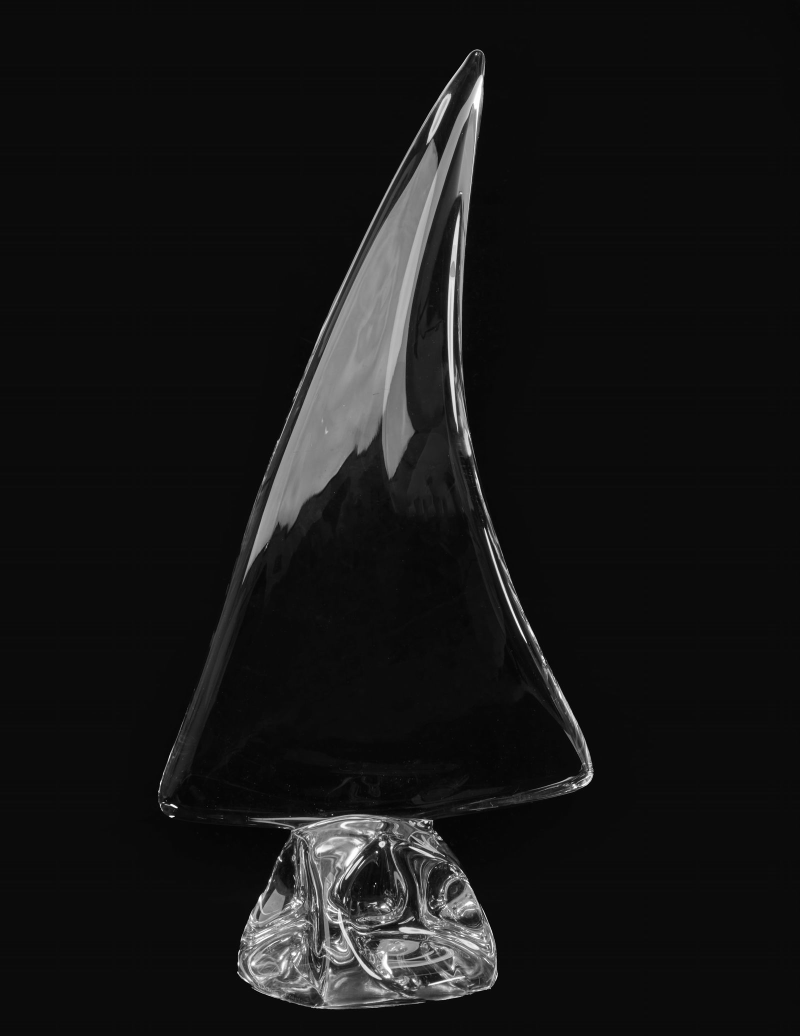 A Daum glass model of a sailboat, modern: A Daum glass model of a sailboatmodernEtched Daum France.height 20in (51cm); width 9 1/4in (23.5cm); depth 5 1/2in (14cm) Provenance:The Collection of Fritz & Lucy Jewett, San Francisco, Calif