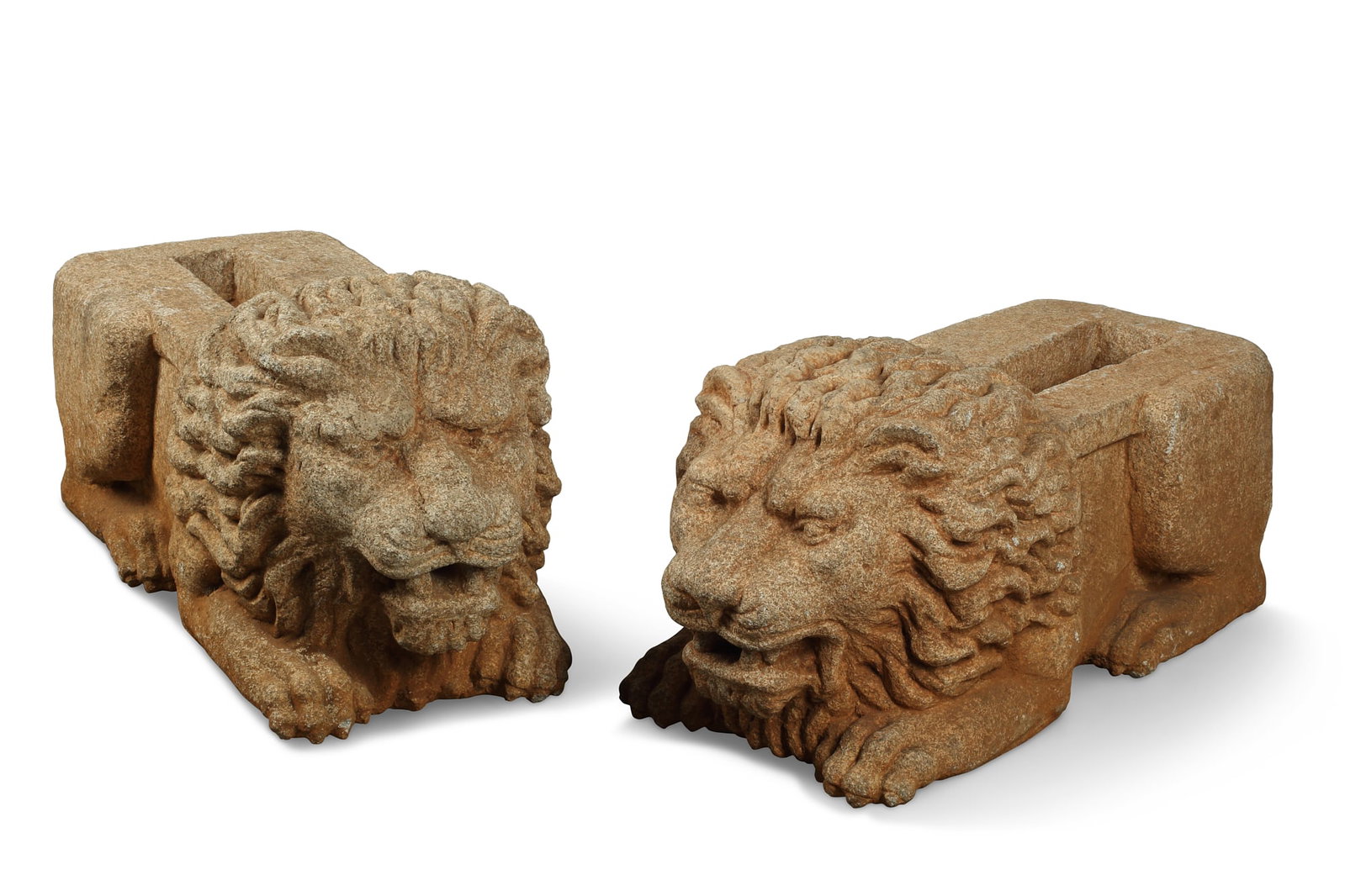 A pair of Baroque style limestone gutterspouts: A pair of Baroque style tinted carved limestone gutterspouts 20th century height 18in (46cm); length 35in (89cm); width 15in (38cm)