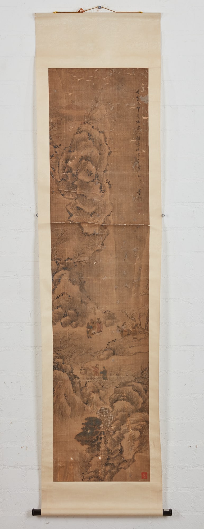 A landscape painting hanging scroll on silk: A landscape painting hanging scroll on silk In the manner of Dong Gao. 67 x 15 3/4in (170 x 40cm) Provenance: Property of a Private Collector, Orange County, CA.
