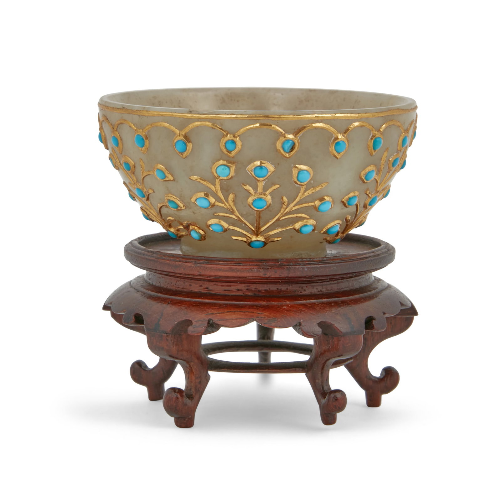 A Mughal style gold kundan work hardstone bowl: A Mughal style gold kundan work 'jewel' set hardstone bowl On stand. height 1 1/8in (3cm); diameter 2 1/4in (6cm)