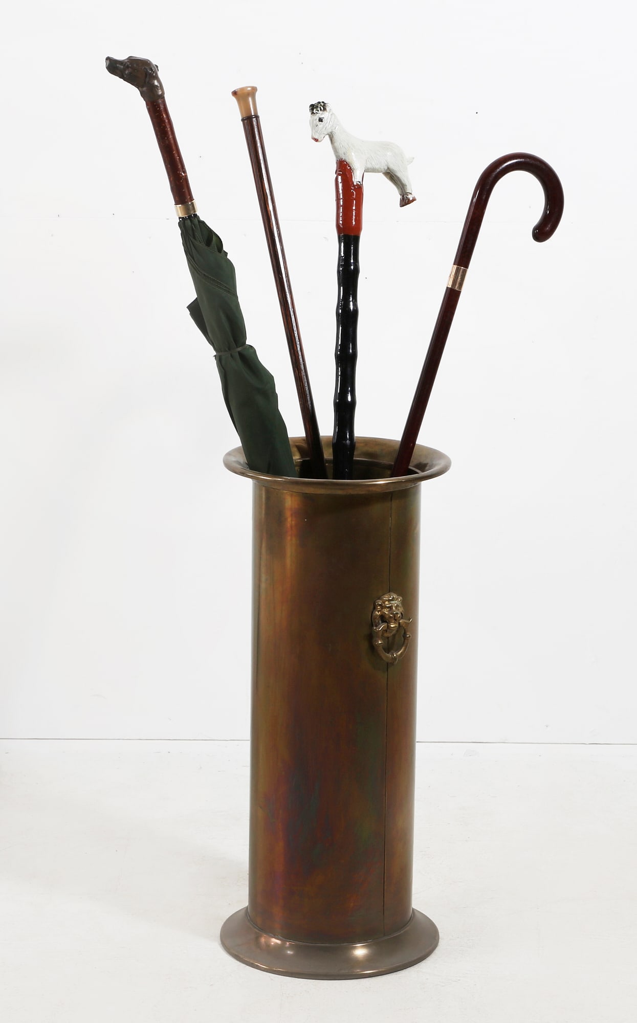 A brass stick stand with canes and umbrella (1 of 3)