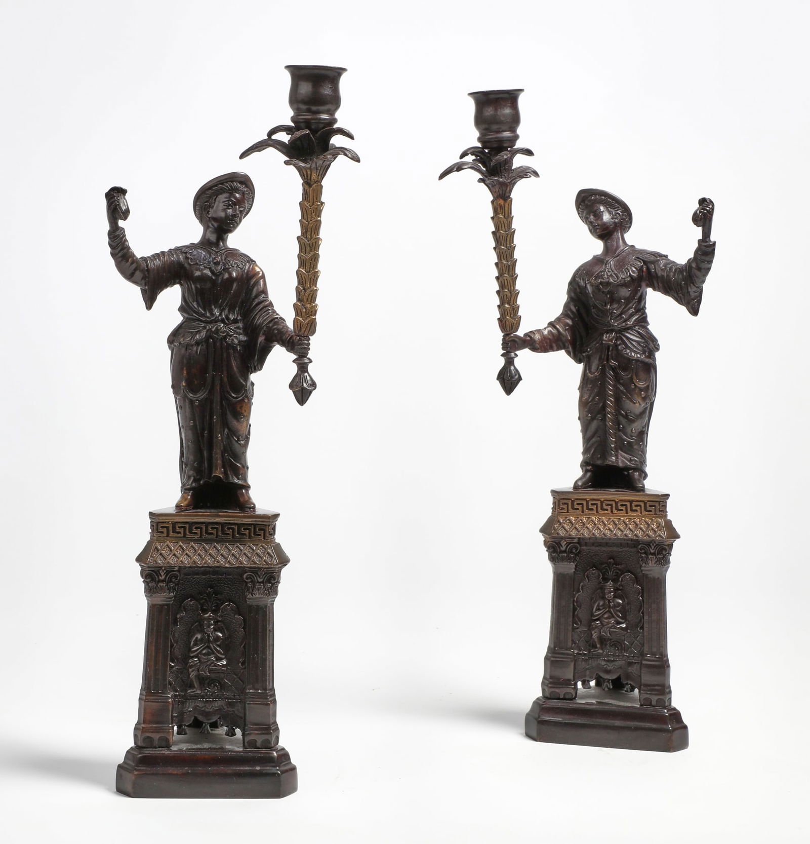 A pair of Chinoiserie candlesticks: A pair of Chinoiserie candlesticksheight 16in (41cm); width 5 3/4in (14.5cm)
