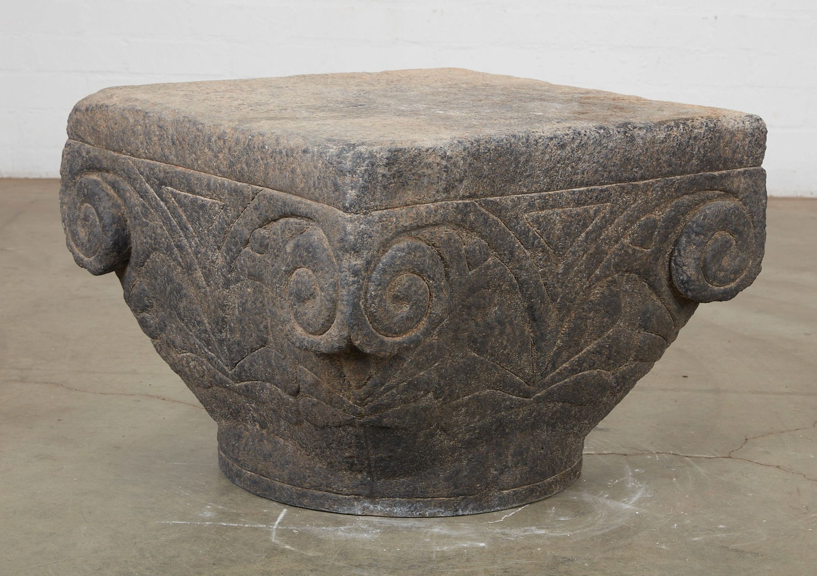 A cast composition faux stone capital (1 of 6)