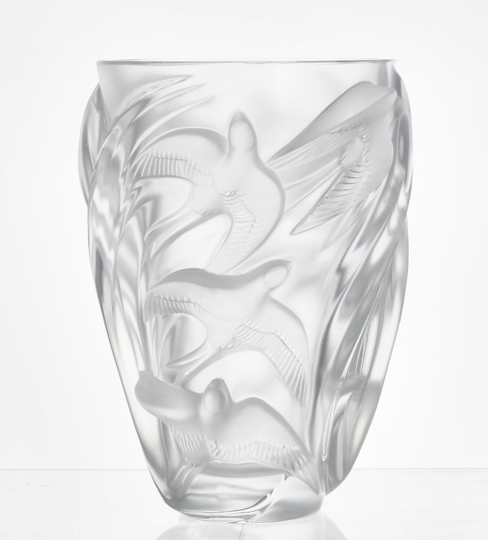 A Lalique clear and frosted glass vase: A Lalique clear and frosted glass vase: Martinets modern Etched Lalique® France. height 9 3/4in (19.5cm); diameter 6 1/4in (15.5cm)