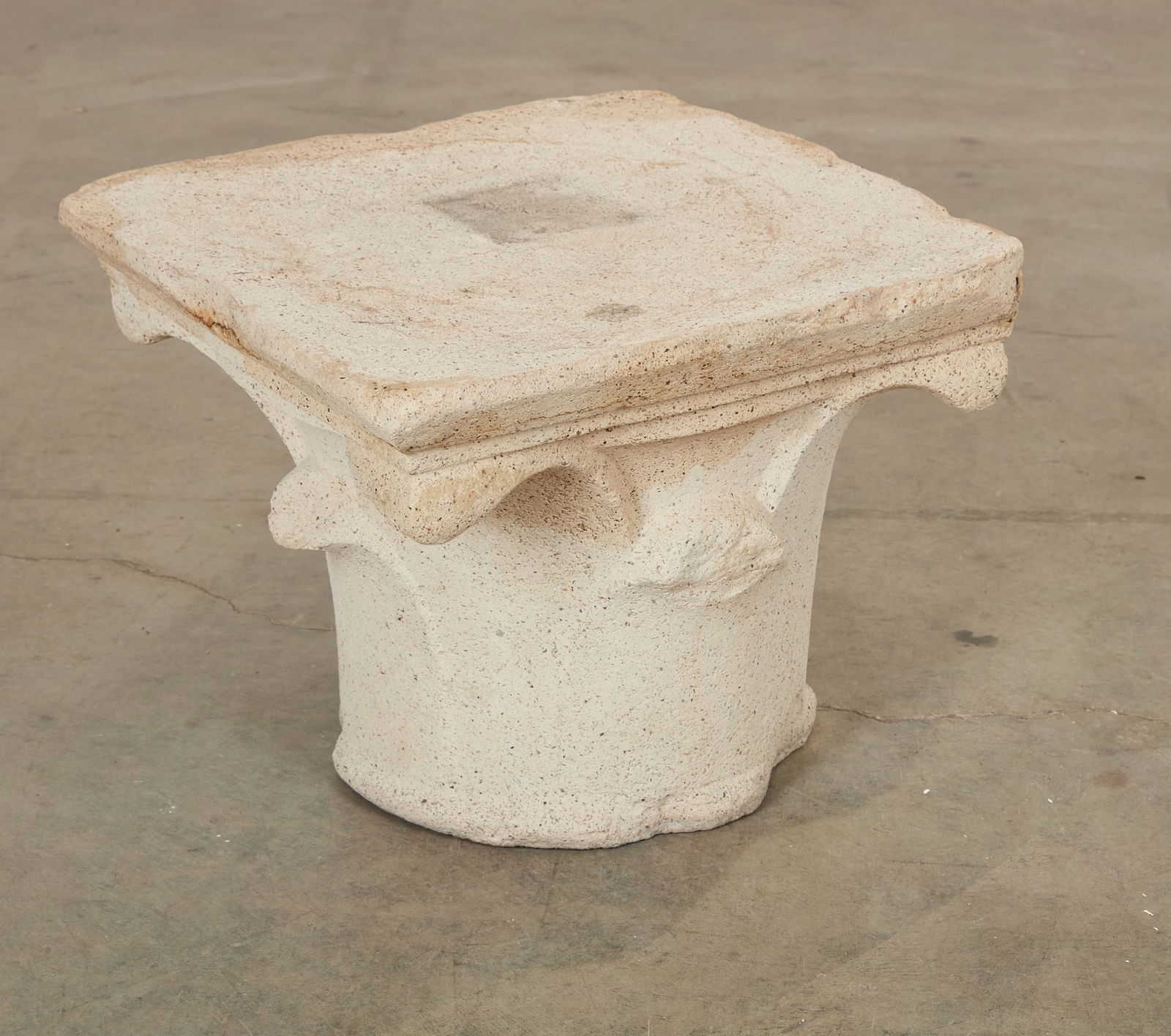 A cast composition faux stone Classic capital: A cast composition faux stone Classic capitalIn the manner Michael Taylormodernheight 15 3/4in (39cm); width 20 3/4in (52cm); depth 20 3/4in (52cm)