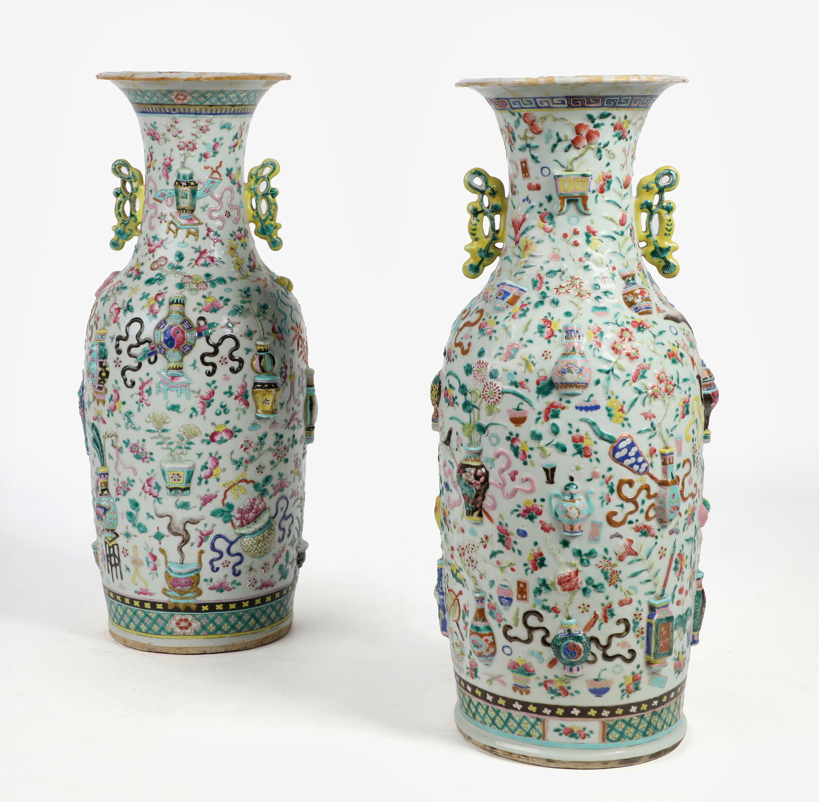 A pair of Chinese relief decorated vases (1 of 7)