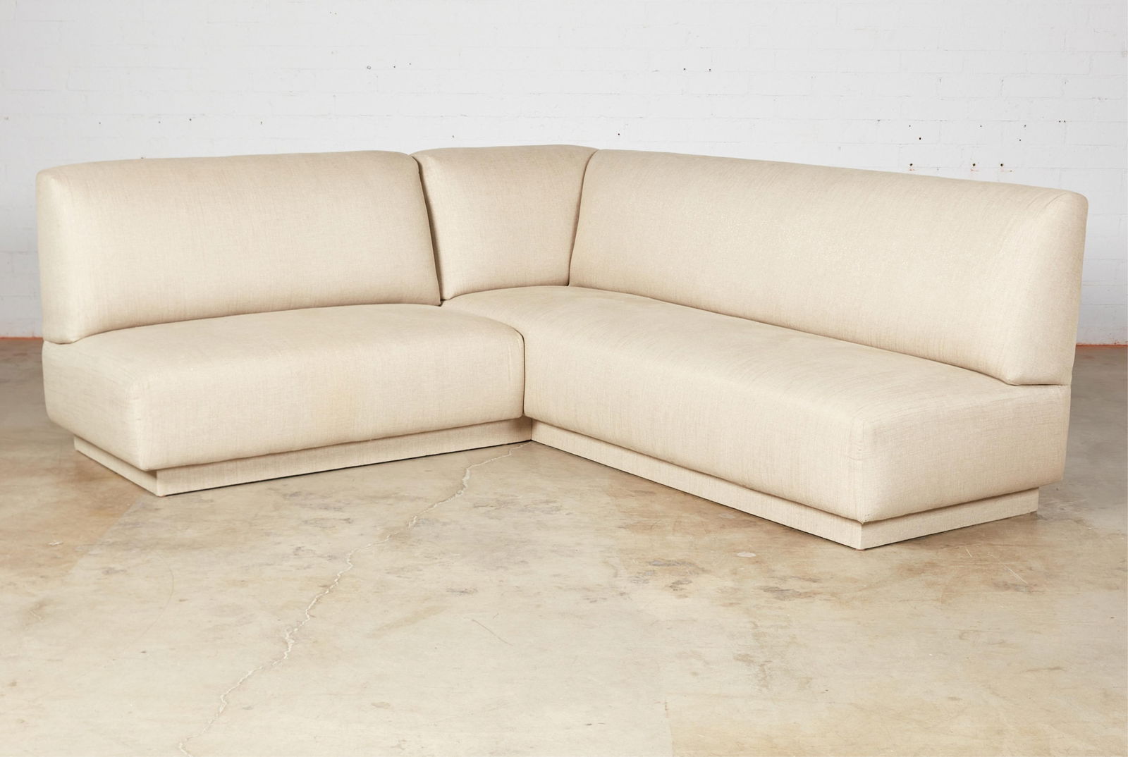 A contemporary fully upholstered sectional sofa (1 of 7)