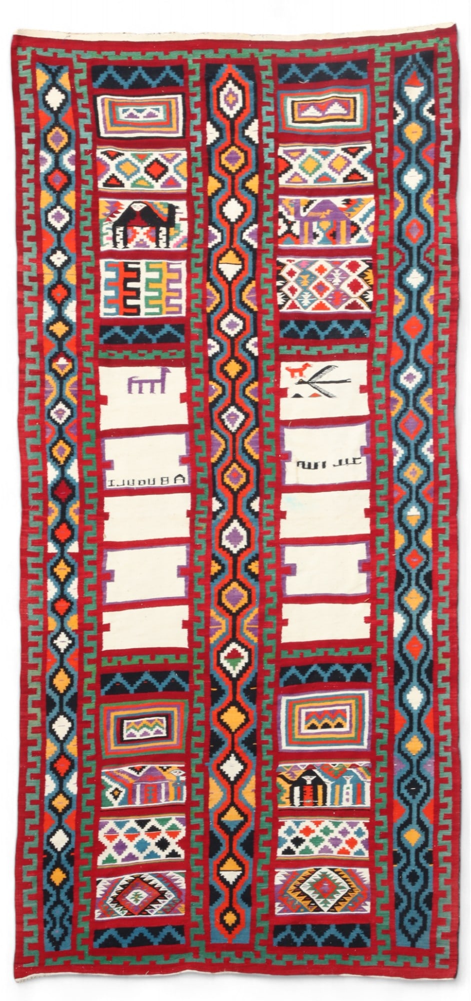 A Turkish Kilim rug, post 1950: A Turkish Kilim rug post 1950 approximately 13ft 8in x 6ft 3in (400 x 187.5cm) Provenance: By repute, property from the Estate of Maurice White.