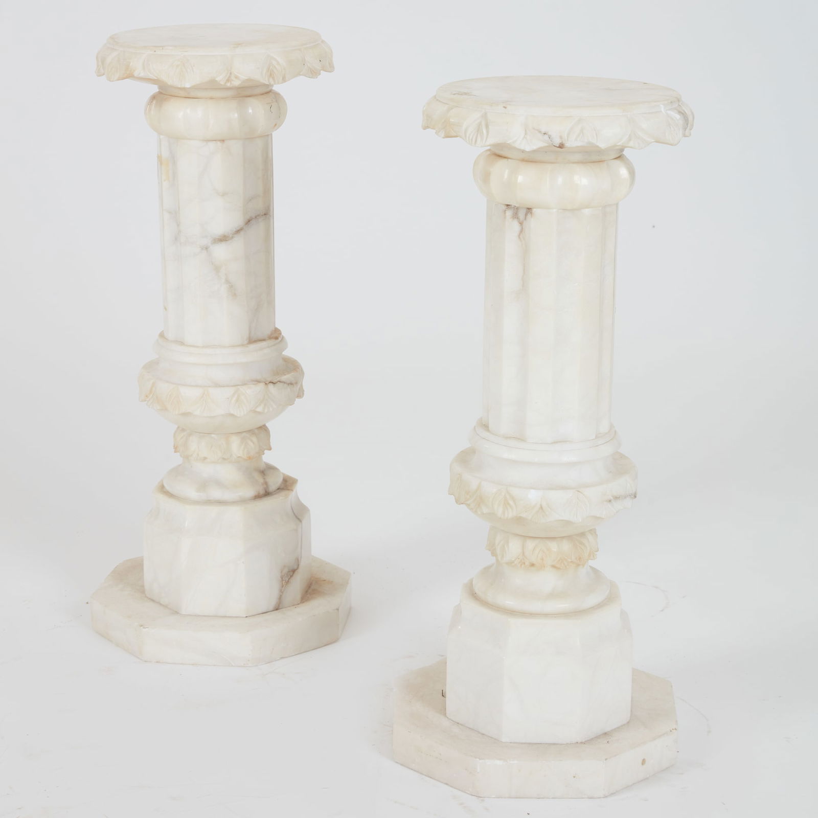 A pair of variegated alabaster low pedestals (1 of 7)