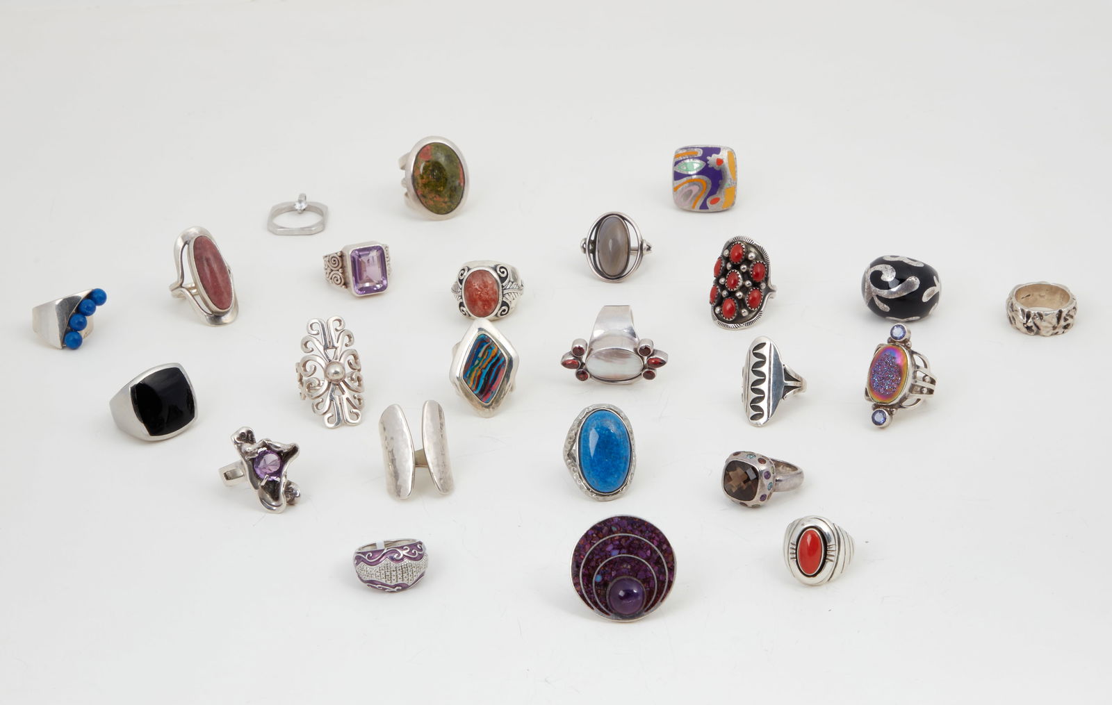 Twenty four silver and hardstone rings (1 of 9)