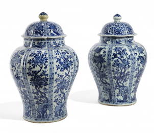 A pair of Chinese covered porcelain vases