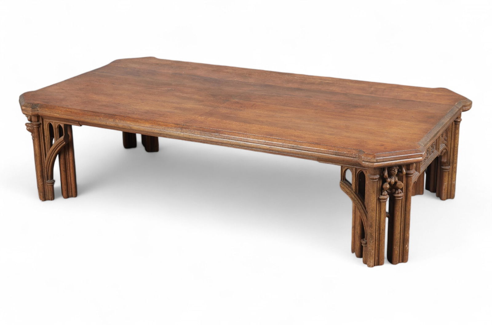 A Gothic Revival style carved oak table (1 of 6)