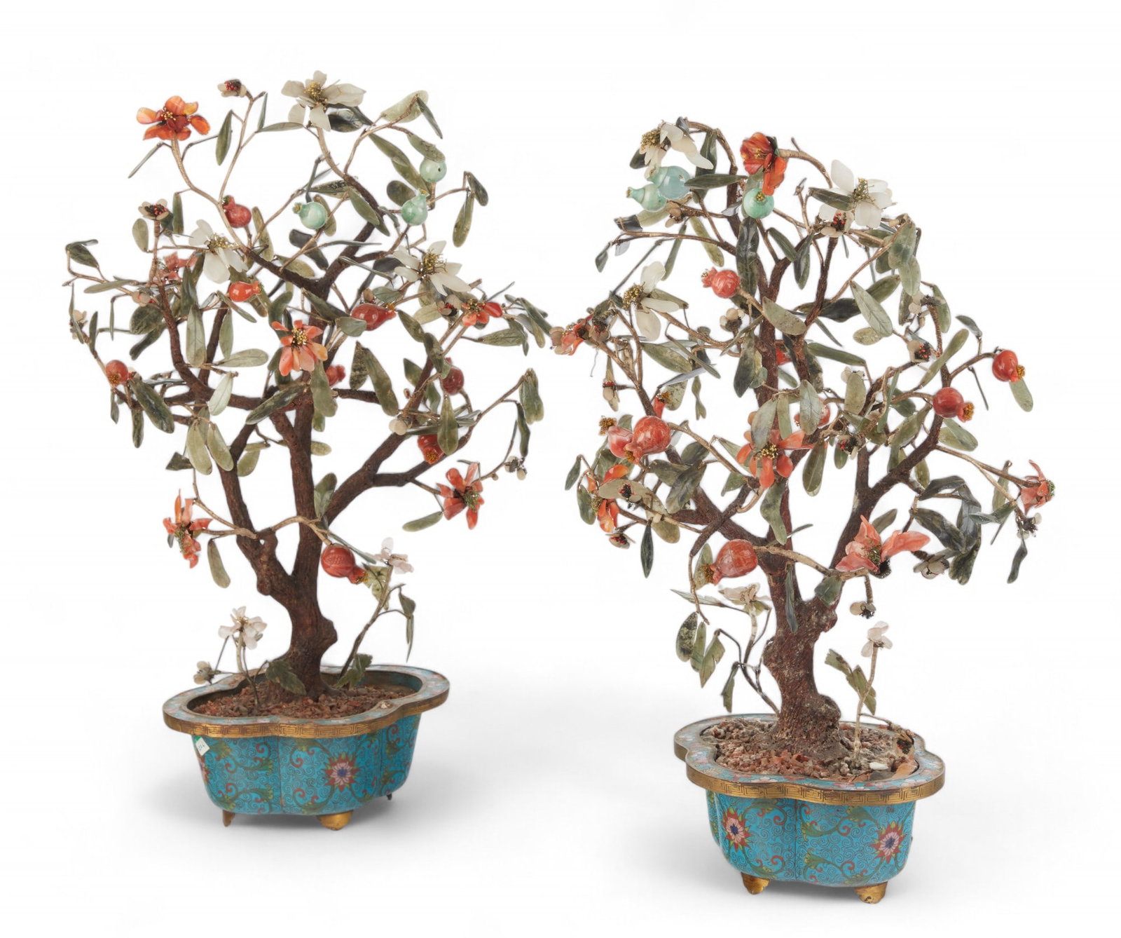 A pair of Chinese cloisonne models of trees: A pair of Chinese hardstone and cloisonne enamel models of trees height 25in (63.5cm); width 17 1/2in (44cm); depth 11in (28cm) Provenance: The estate of Frederick Faude, Sausalito, California.