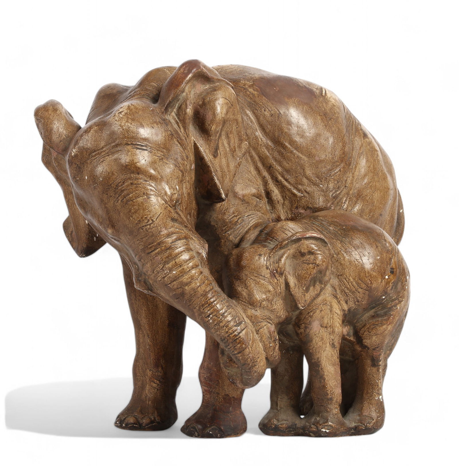 A painted ceramic model of an elephant and calf: A painted ceramic model of an elephant and her calfafter the model by Guido Cacciapuoti (1892-1953)height 11in (27.5cm); width 11 1/2in (29cm); depth 8in (20cm)