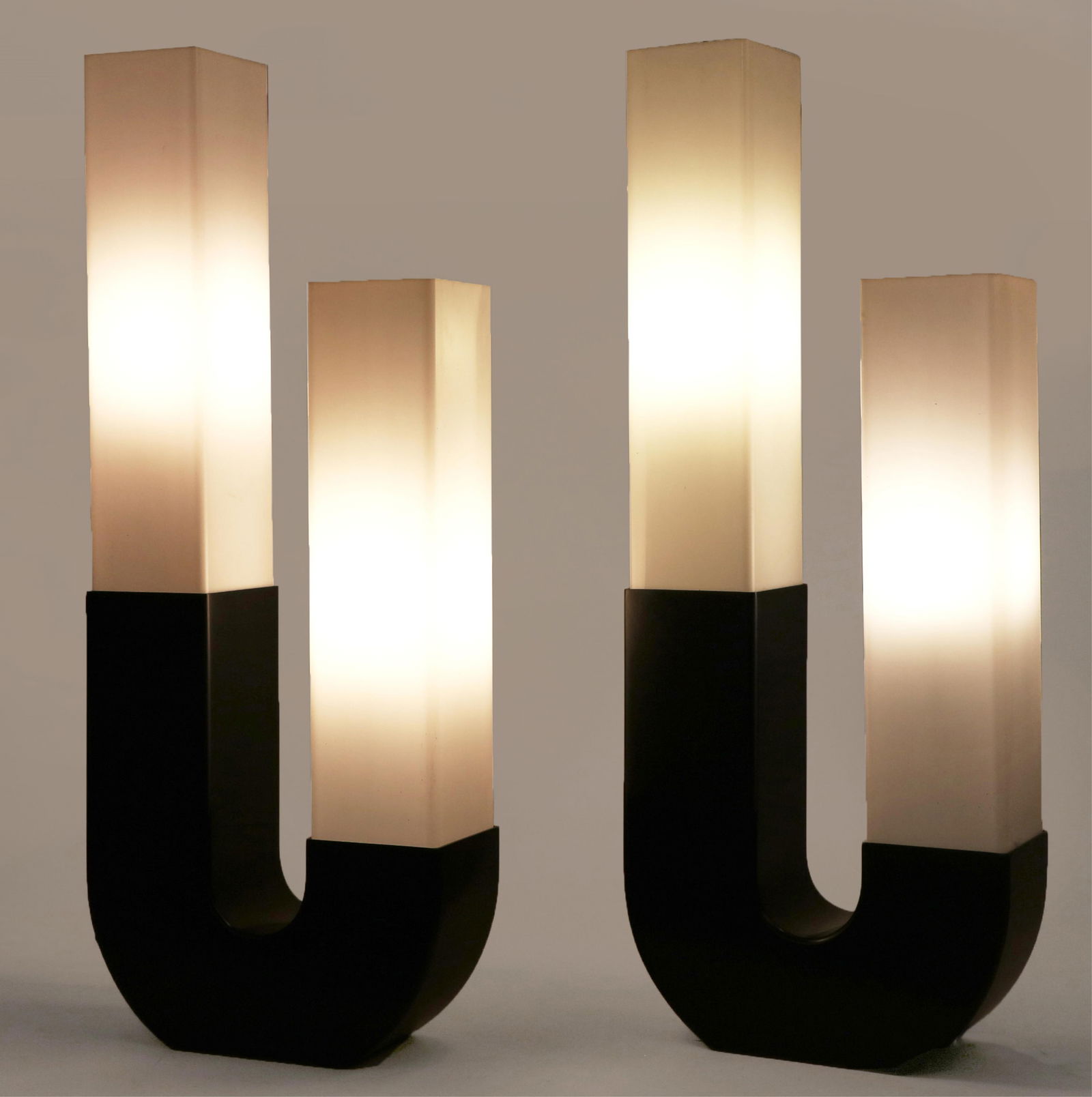 A pair of Modeline U form table lamps (1 of 7)