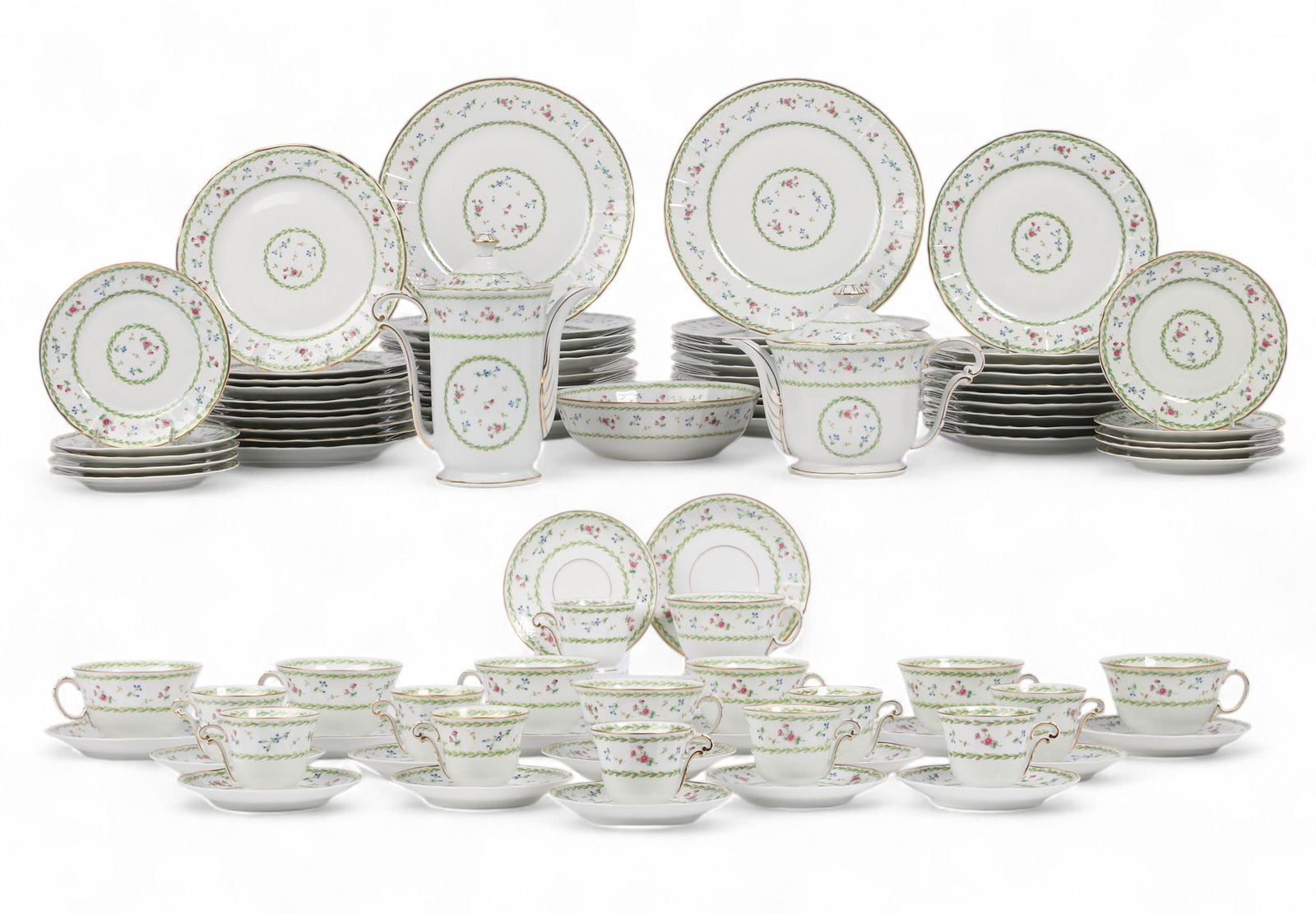 A Bernardaud Limoges Artois Vert service: A Bernardaud Limoges porcelain Artois Vert dinner service20th centuryComprising twenty (10in) plates, twenty (8 1/2in) plates, ten (6 1/2in) plates, eight large cups and saucers, ten small cups and el
