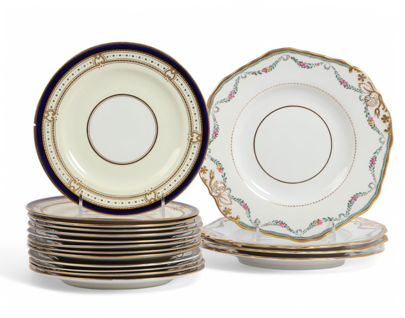 A set of thirteen George Jones 8in salad plates Retailed by Tiffany & Co.: A set of thirteen George Jones eight inch salad plates Retailed by Tiffany & Co. Together with four Copeland 9 1/4in luncheone plates, retailed by T. Good & Co., London. (17)