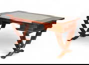 An Andre Arbus brass mounted mahogany desk