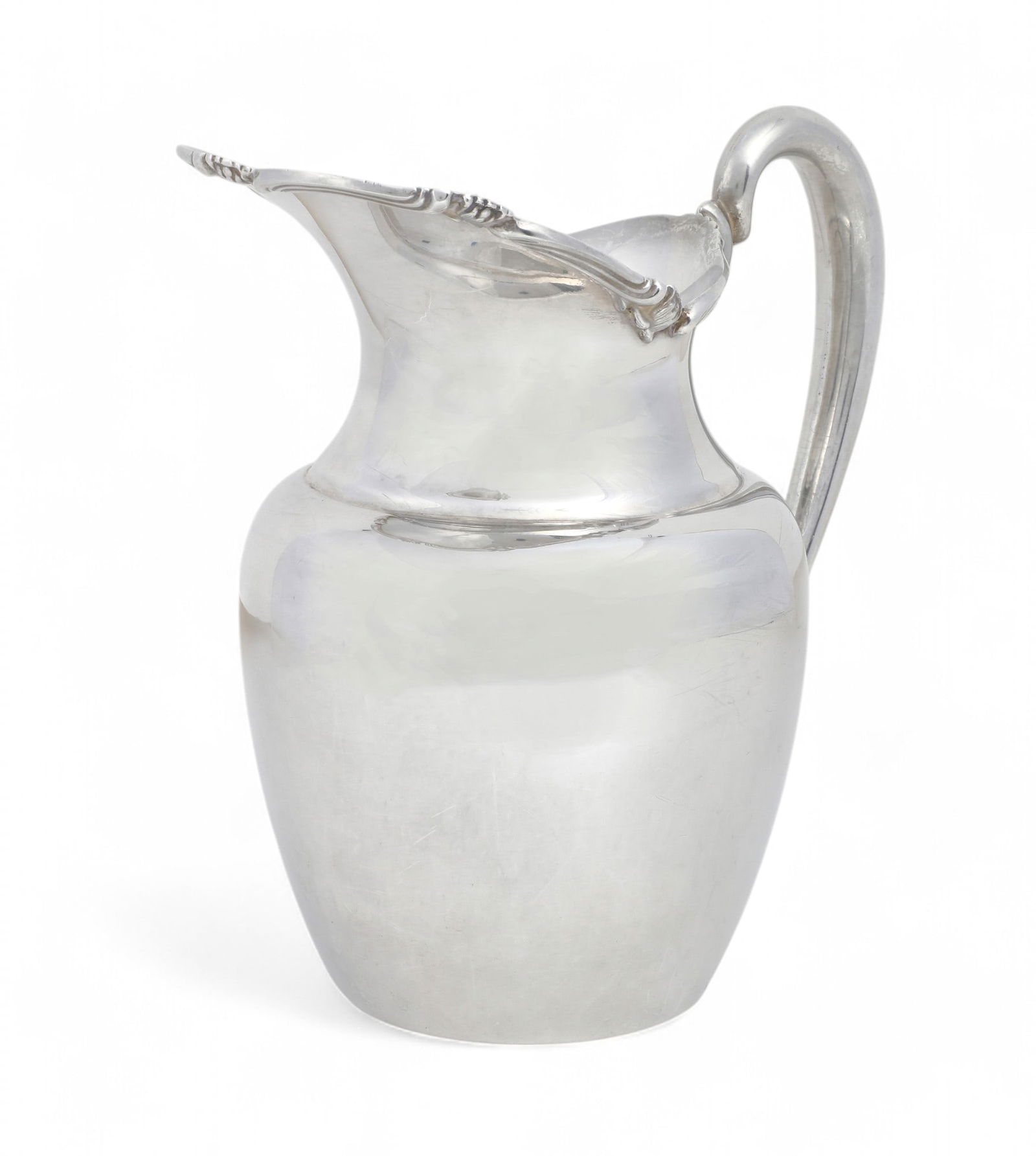 A Peruvian sterling silver water pitcher (1 of 3)