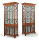 A pair of George III style pine display cabinets