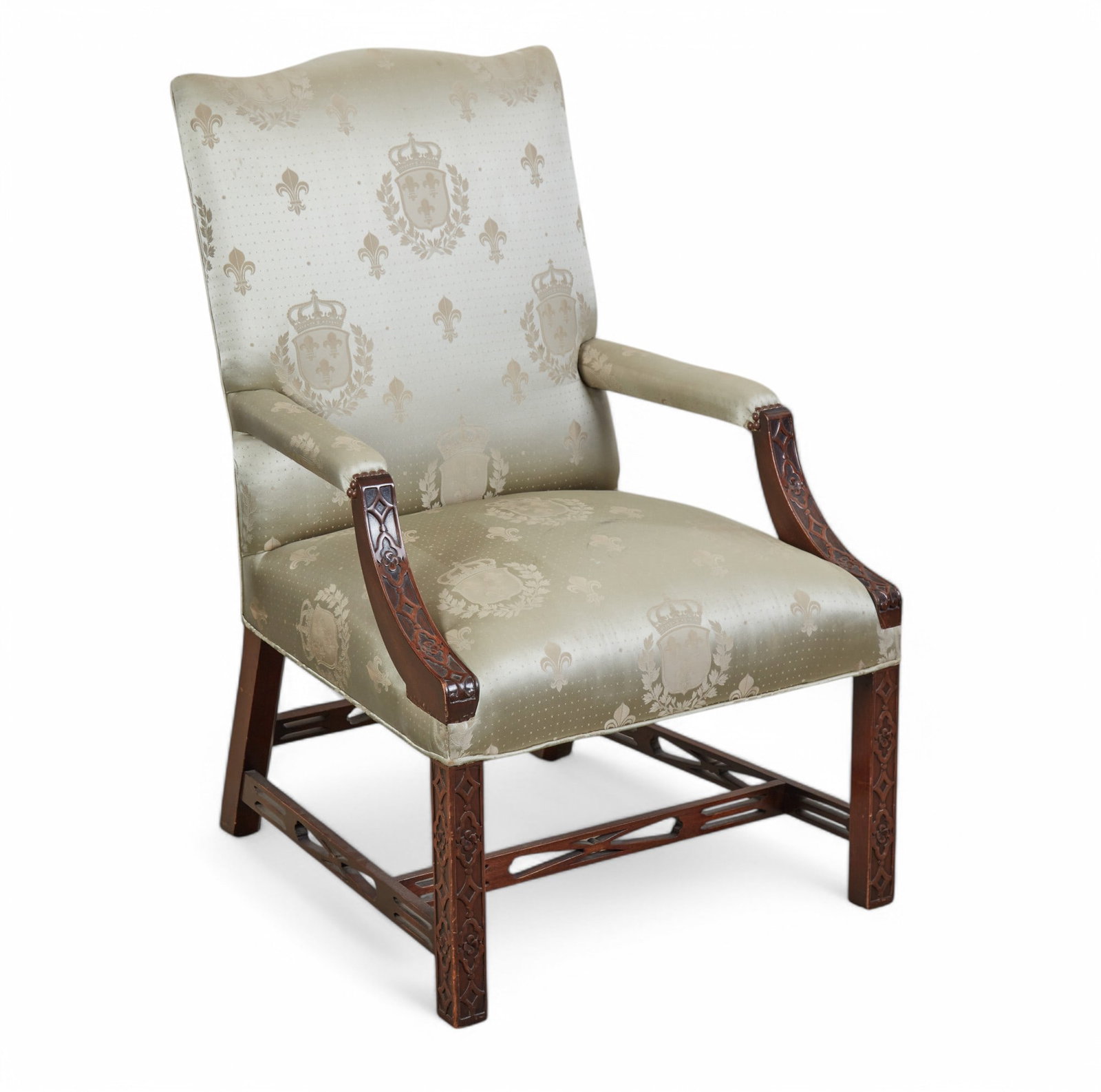 A George III style mahogany library armchair: A George III style mahogany library armchair 20th century height 42in (110cm); width 26in (66cm); depth of seat 20 1/2in (52cm)