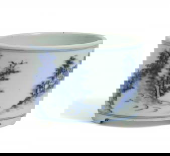 A Chinese blue and white glazed brush pot: A Chinese blue and white glazed porcelain brush potheight 3in (7.5cm); diameter 4 1/4in (10.5cm) Provenance:With Geoffrey Waters, London.
