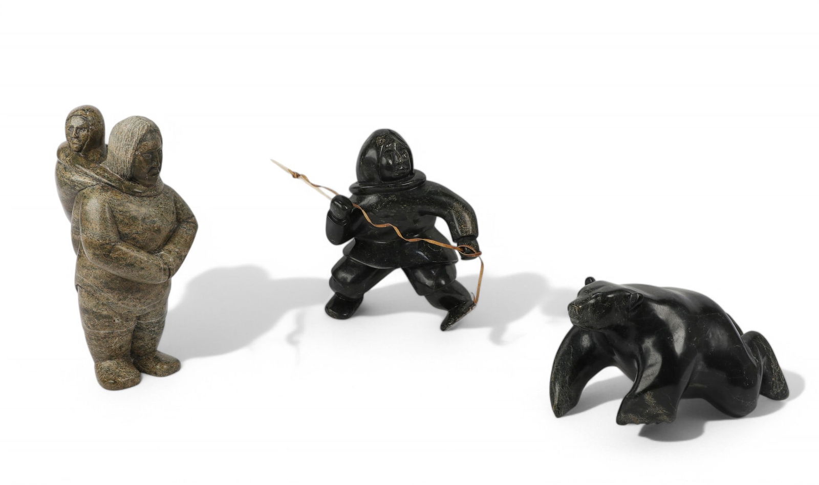 Three Inuit carved serpentine figures (1 of 6)
