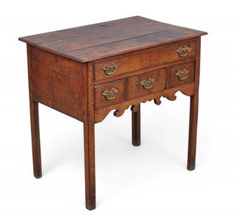 A George III oak side table: A George III oak side tablethird quarter 18th centuryheight 28in (71cm); width 29 1/2in (75cm); depth 20in (51cm)
