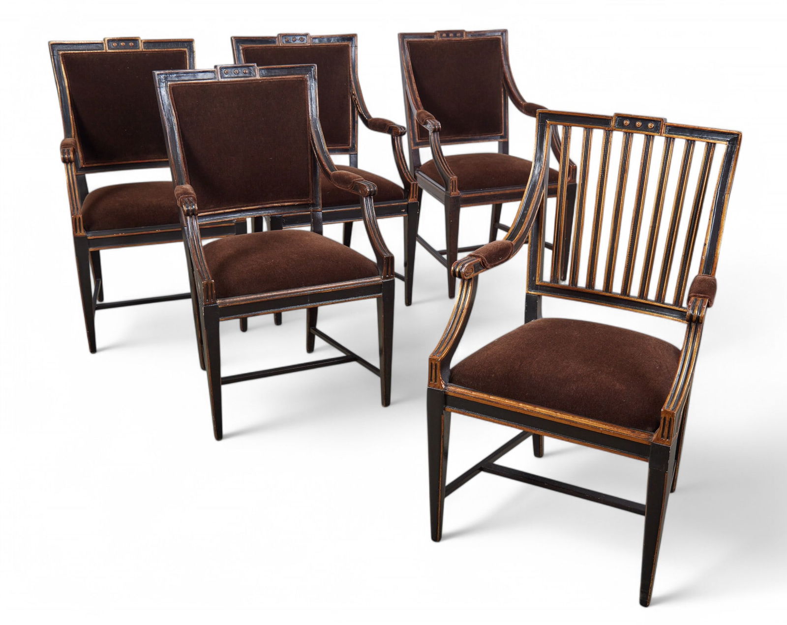 Five Charles Pollock Neoclassical style armchairs: A set of five Charles Pollock Neoclassical style parcel gilt ebonized armchairsmodernOne with open slat back.height 40in (102cm); width 23in (59cm); depth of seat 18 1/2in (47cm)