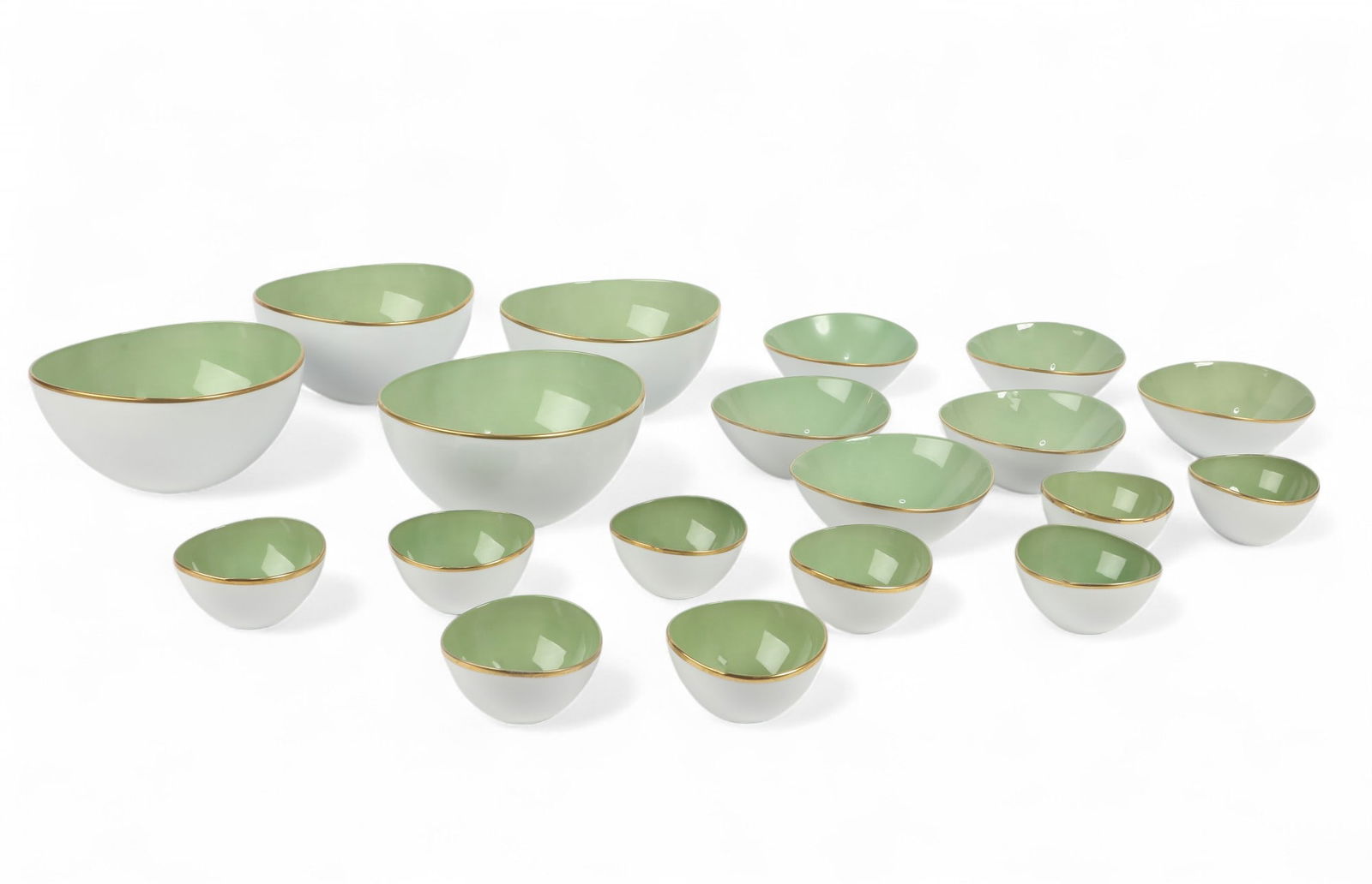 A group of Anna Weatherley serving bowls: An assembled group of Anna Weatherley porcelain serving bowls in the Anna Colors Mint Green patternmodernComprising four 9in bowls, six 7in bowls, and nine 4 1/4in bowls, each with printed factory mar