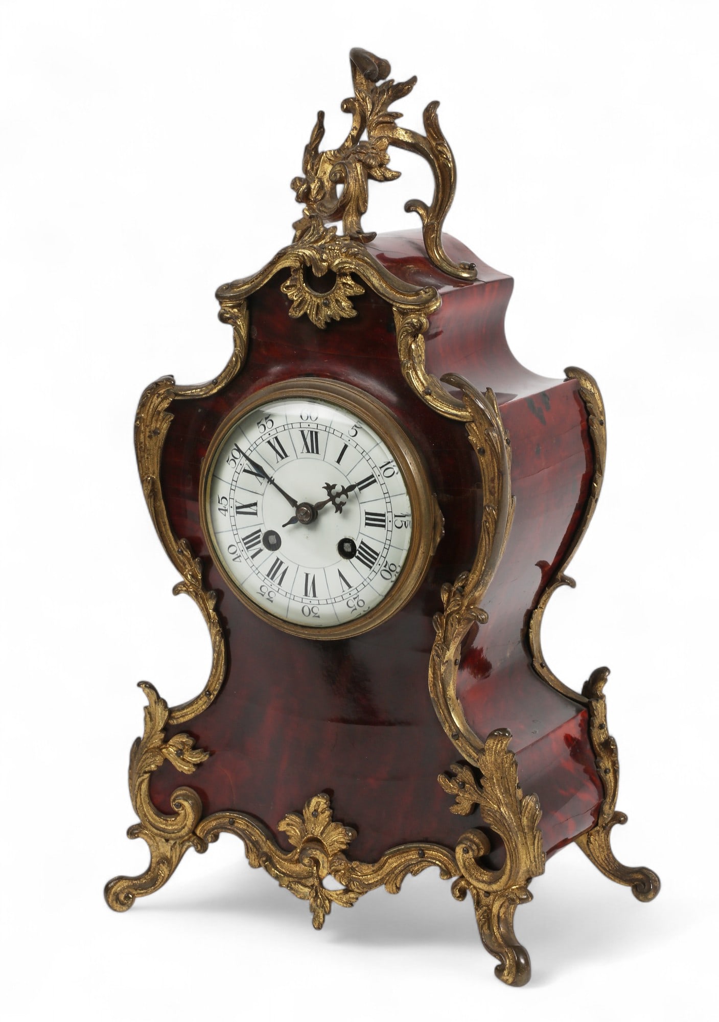 A Louis XV style gilt bronze mounted mantel clock: A Louis XV style gilt bronze mounted mantel clockcirca 1900The twin train movement striking on a bell.height 15in (37.5cm); width 8 1/2in (21cm); depth 5 1/2in (14cm)
