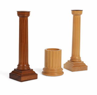 Three David Linley treen table articles, modern: Three David Linley treen table articlesmodernComprising a fruitwood columnar candlestick, a walnut columnar candlestick and a fruitwood columnar utensil holder, each impressed LINLEYcandlesticks heigh