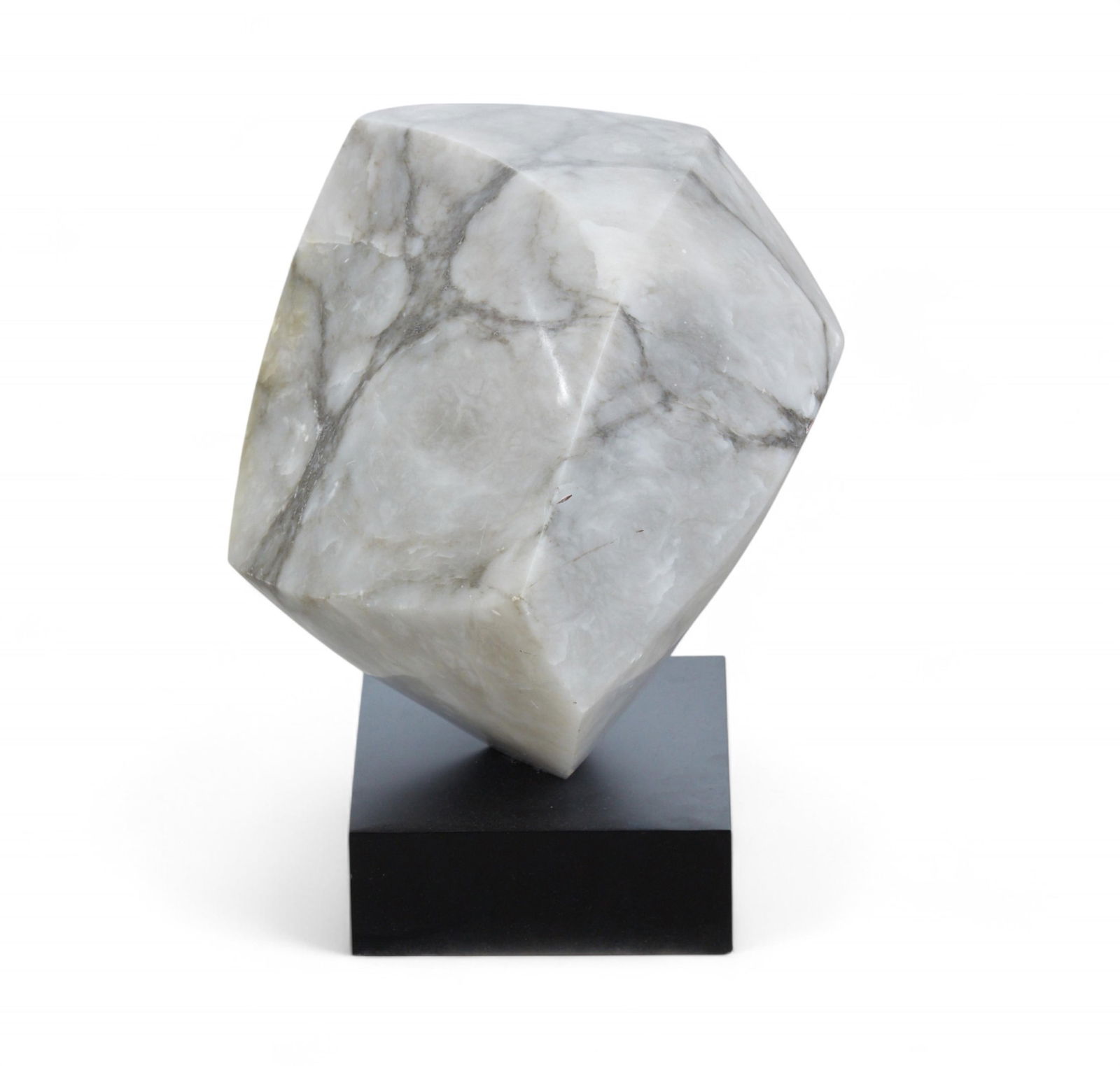 An alabaster specimen, modern: An alabaster specimenmodernMounted on an ebonized plinth.overall height 17 1/2in (44cm); width 12in (30.5cm); depth 13in (33cm)