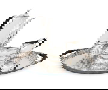 A Danish sterling silver Cosmos coffee service, designed by Johan Rohde for Georg Jensen