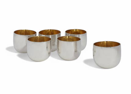 A set of six Bvlgari sterling silver rocking tumbler cups, 1973: A set of six Bvlgari sterling silver rocking tumbler cups 1973 height 2 1/2in (6cm); diameter 2 3/4in (7cm); total weight approximately 36oz troy Provenance: Property from a Private Collection,