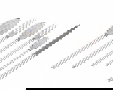 A Puiforcat first standard silver part Cannes flatware service, 20th century: A Puiforcat first standard silver part Cannes flatware service 20th century Comprising 2 dinner forks, 4 dinner knives, 2 soup/dessert spoons, 5 salad/dessert forks, 2 teaspoons and 2 table spoons.