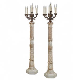 A pair of Continental Neoclassical style carved alabaster and bronze floor lamps, early 20th century: A pair of Continental Neoclassical style carved alabaster and bronze floor lamps early 20th century height to top of tazza 73in (185cm); diameter 17 1/2in (44cm) Provenance: Property from a Private