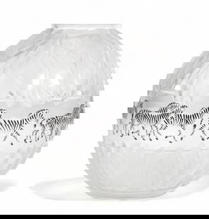 A Lalique enameled clear and frosted glass Tanzania Zebra vase, model by Marie Claude Lalique: A Lalique enameled clear and frosted glass Tanzania Zebra vasemodel by Marie Claude Lalique20th centuryEtched Lalique ? / France 922.height 8 1/2in (53cm); diameter 7in (18cm) Provenance:
