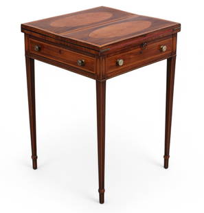 A George III satinwood inlaid mahogany fold top games table, late 18th century: A George III satinwood inlaid mahogany fold top games tablelate 18th centuryThe dual hinged top opening to a baize lined interior, with single frieze drawer.height 29in (72.5cm); width 20in (50cm); wi
