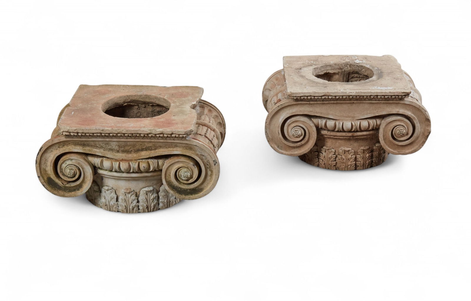 Two English Coade stone Ionic capitals, late 18th/early 19th century: Two English Coade stone Ionic capitalslate 18th/early 19th centuryheight 11in (28cm); width 20 1/2in (52cm); depth 14in (36cm) Provenance:Property from a Private South Pasadena, CA Collection.