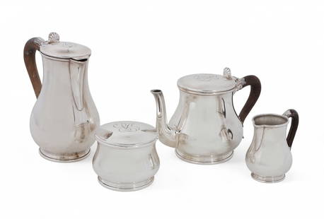 A four piece Puiforcat first standard silver tea and coffee service, 20th century: A four piece Puiforcat first standard silver tea and coffee service20th centuryComprising a teapot, a coffee pot, a cream jug and a covered sugar bowl, monogramed.coffee pot height 8 1/2in (21cm); tea