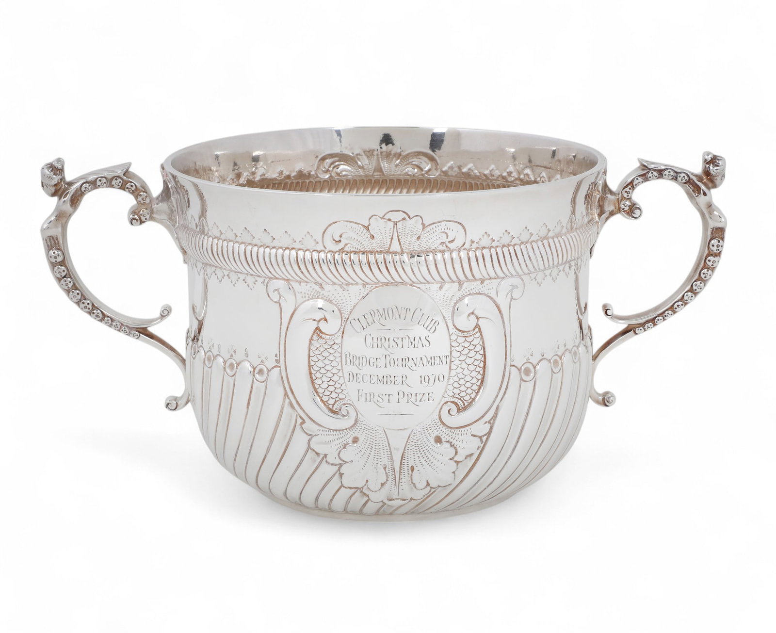 A Victorian sterling silver two handled trophy cup, Daniel & Charles Houle, London, 1884: A Victorian sterling silver two handled trophy cup Daniel & Charles Houle, London 1884 Engraved with presentation inscription to one side and coat-of-arms with motto opposite. height 5 3/4in (15cm); w