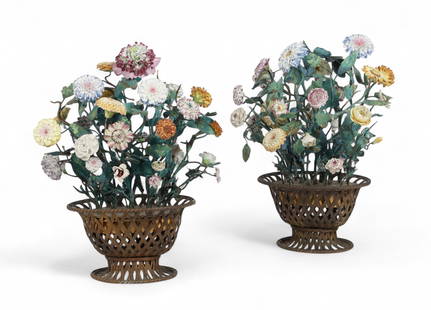 A pair of French porcelain mounted tole flower baskets, 19th century: A pair of French porcelain mounted tole flower baskets19th centuryheight 17 1/2in (44cm); width 14in (35cm); depth 10in (25.5cm) Provenance:Property from a Private Bel Air Estate.