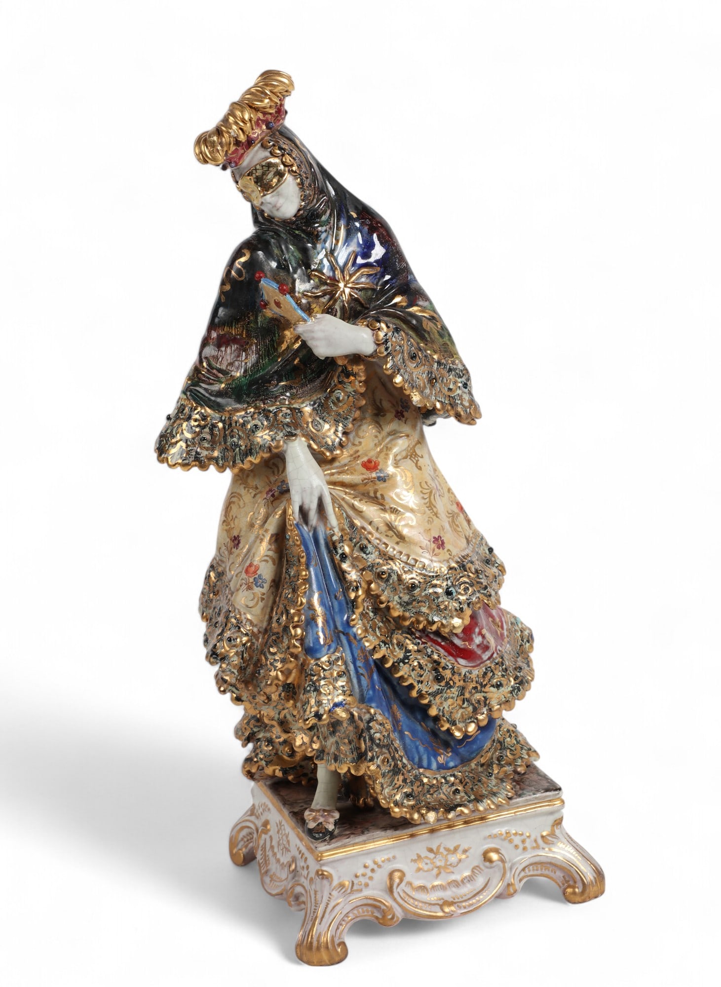 An Italian terracotta figure of a Venetian masked dancer, Eugenio Pattarino (Italian, 1885 - 1971): An Italian terracotta figure of a Venetian masked dancerEugenio Pattarino (Italian, 1885 - 1971)20th centuryWith painted signature Prof. E. Pattarino / Italy to underside.height 15in (37.5cm); width 6