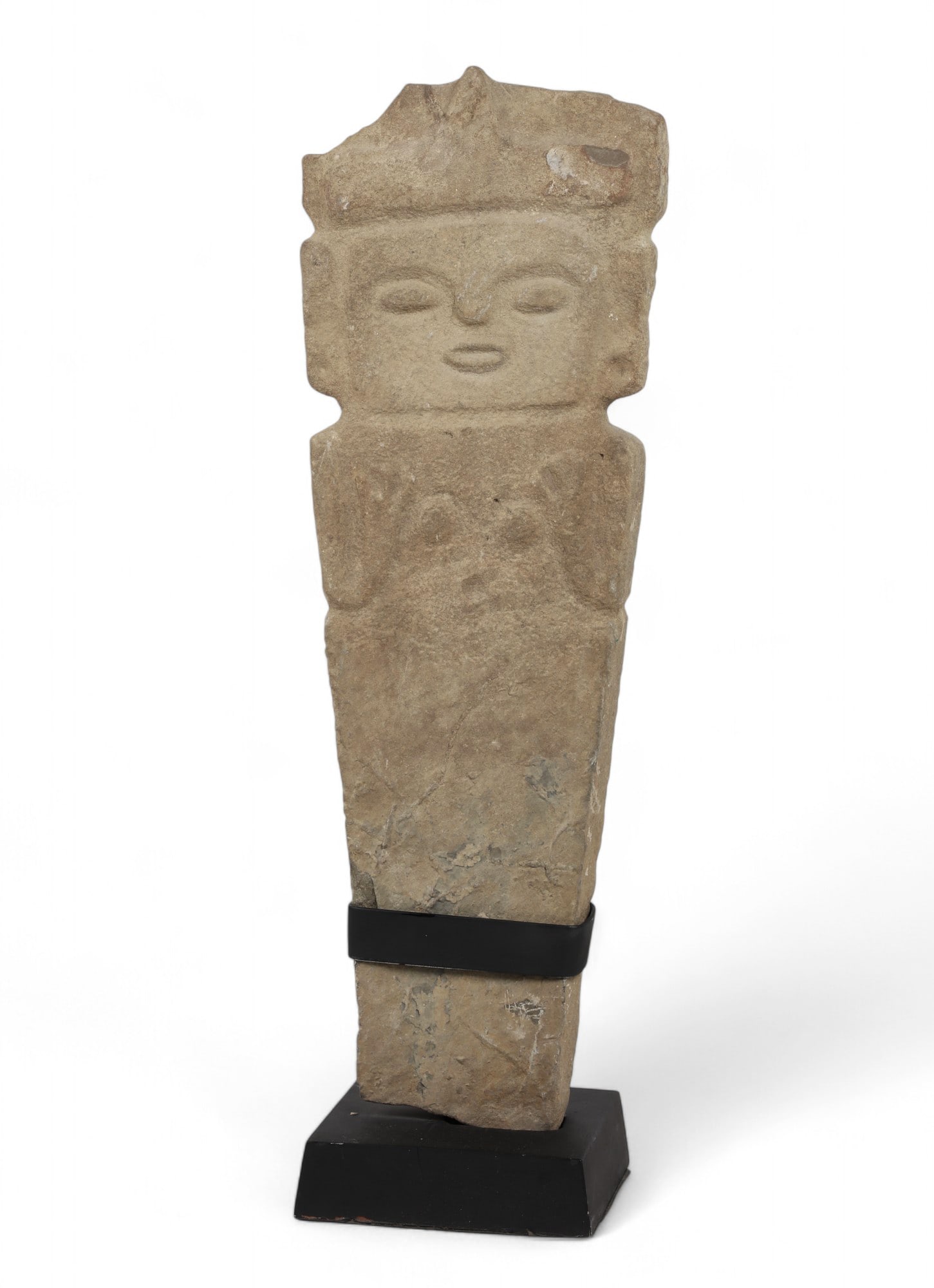 A South American stone female effigy: A South American stone female effigy On stand. overall height 26 1/2in (67cm); width 8 1/2in (21.5cm); depth 5 3/4in (14.5cm) Provenance: Property from a San Diego, CA Collection.